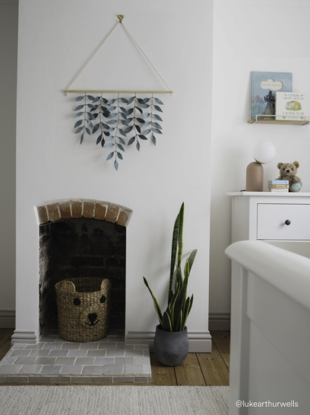 Image of  white room and fireplace feature 
