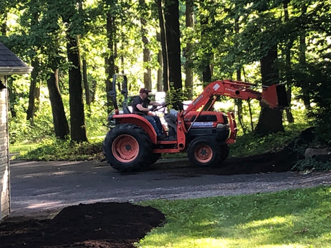 Moving mulch with a tractor