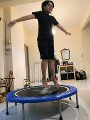 ASD Child jumping on rebounder