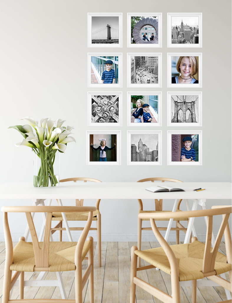 Wondering what to do with a blank wall? Want to create a Gallery Wall that WORKS? We've got tips to help you decorate your empty space, whether it's in your living room, bedroom or office -  along with a FREE ebook full of more ideas! #gallerywallideas #gallerywalllayout #blankwallideas #gallerywalllivingroom #minimalistgallerywall