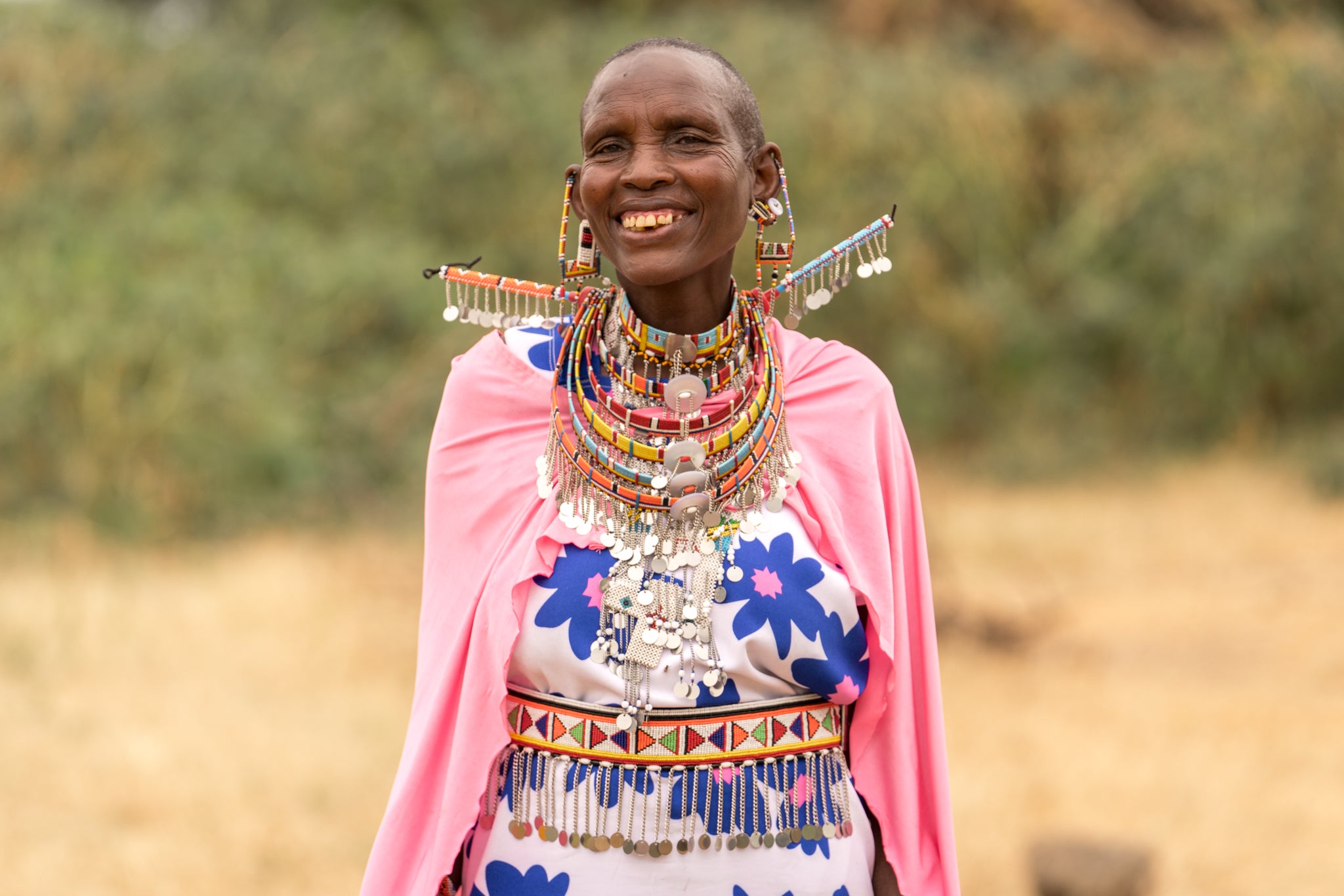 traditional African Maasai woman wearing beaded necklace and