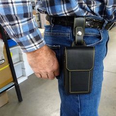 Holster style phone case attached onto the belt fully using belt strap attachment