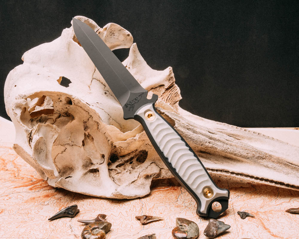 Dive knife- white over black, armor black cerakote, brass allen bolts, reticulated grip - Half Face Blades product image