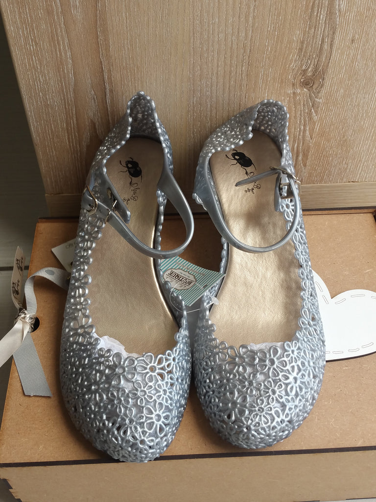 silver jelly shoes