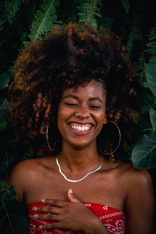 Curly hair works well with large hoop earrings Blue Morning Expressions