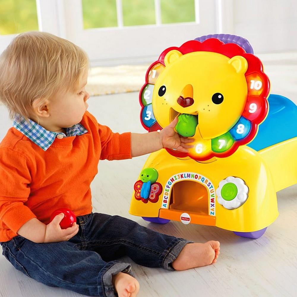 fisher price stride and ride lion