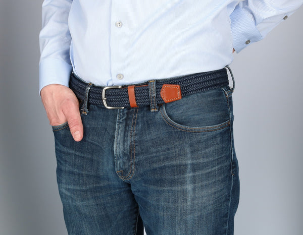 Man wearing a navy and brown belt