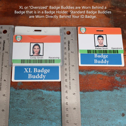 Two ID badges are shown. The left badge, featuring a woman's photo and text: “Cindy Smith, Receiving,” is displayed with an XL Custom Badge Buddy underneath for role recognition. The right badge displays a man's photo and text: "Rafael Smith, Operations," paired with a Fully Customizable Badge Buddy Horizontal - (Standard Size) beneath. Two rulers are on either side.