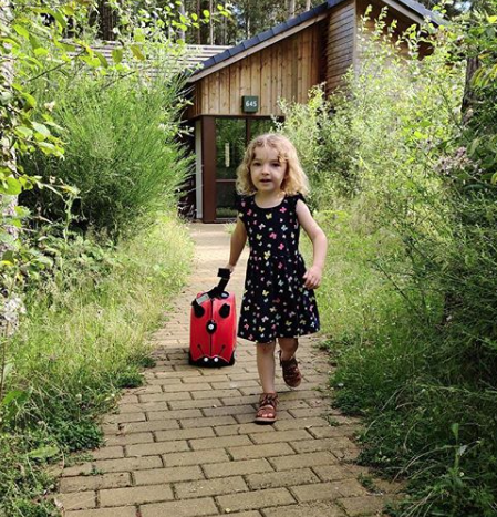 Harley Ladybird Trunki in the garden