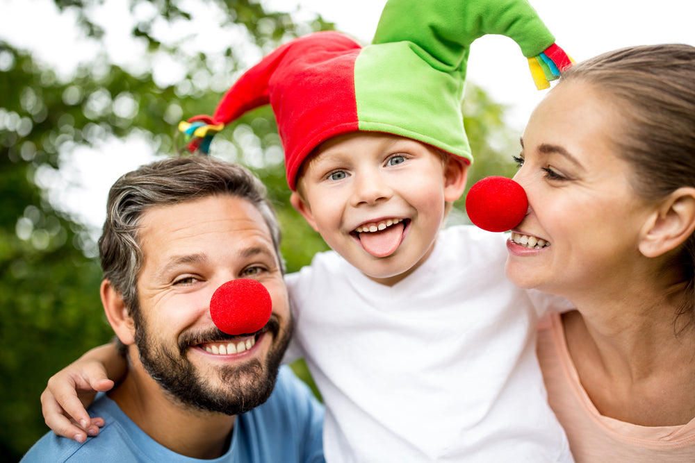 Image of parents with child at dress up party