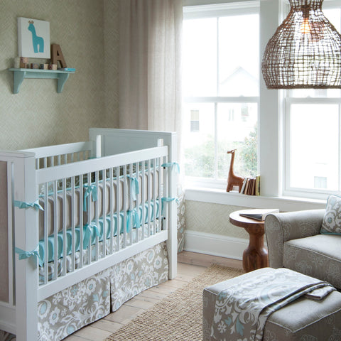 white cot in baby's room