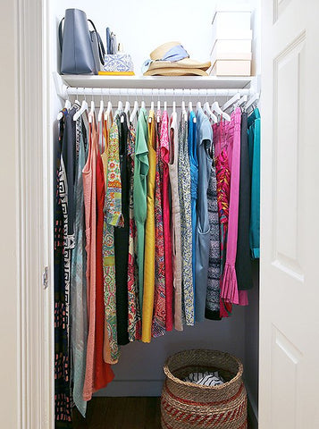 store room closet with brightly colored clothes