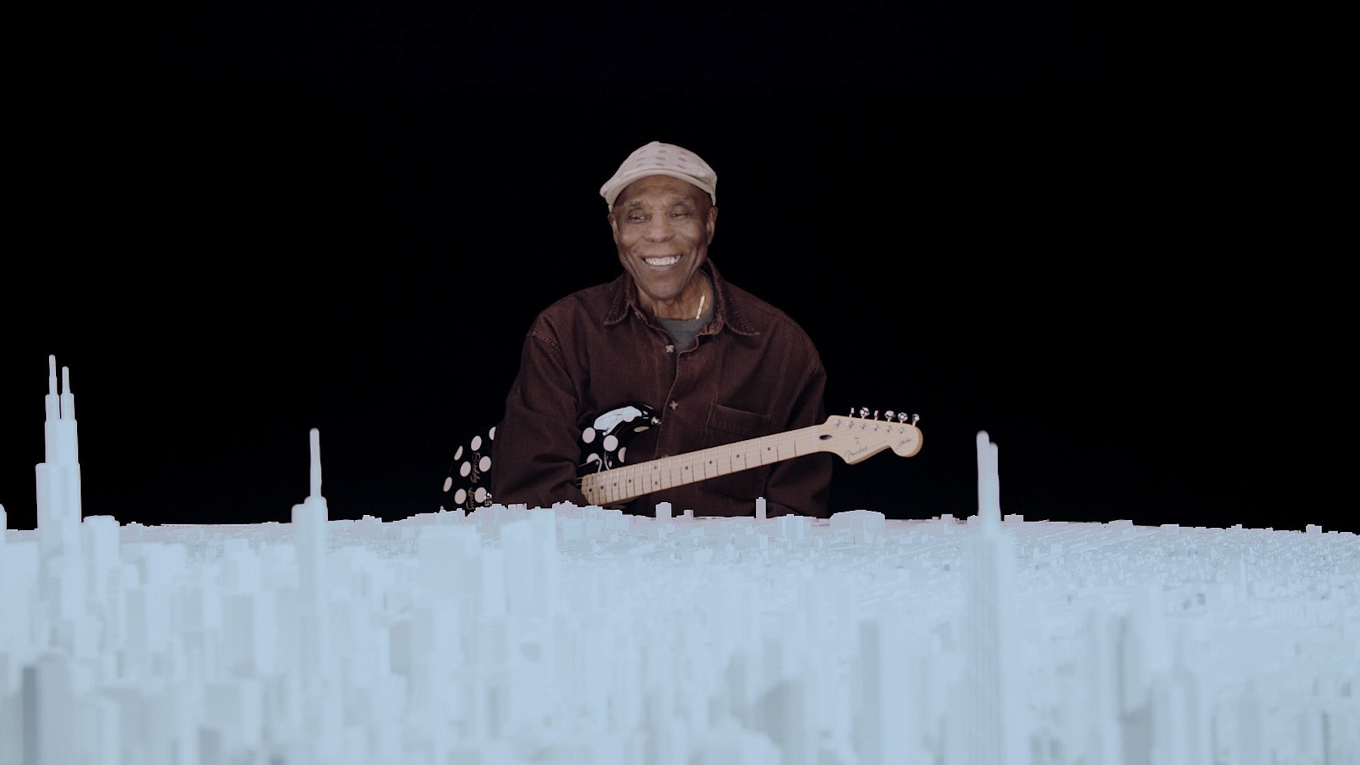 Buddy Guy with Microscape's 15 foot diameter circular model of Chicago