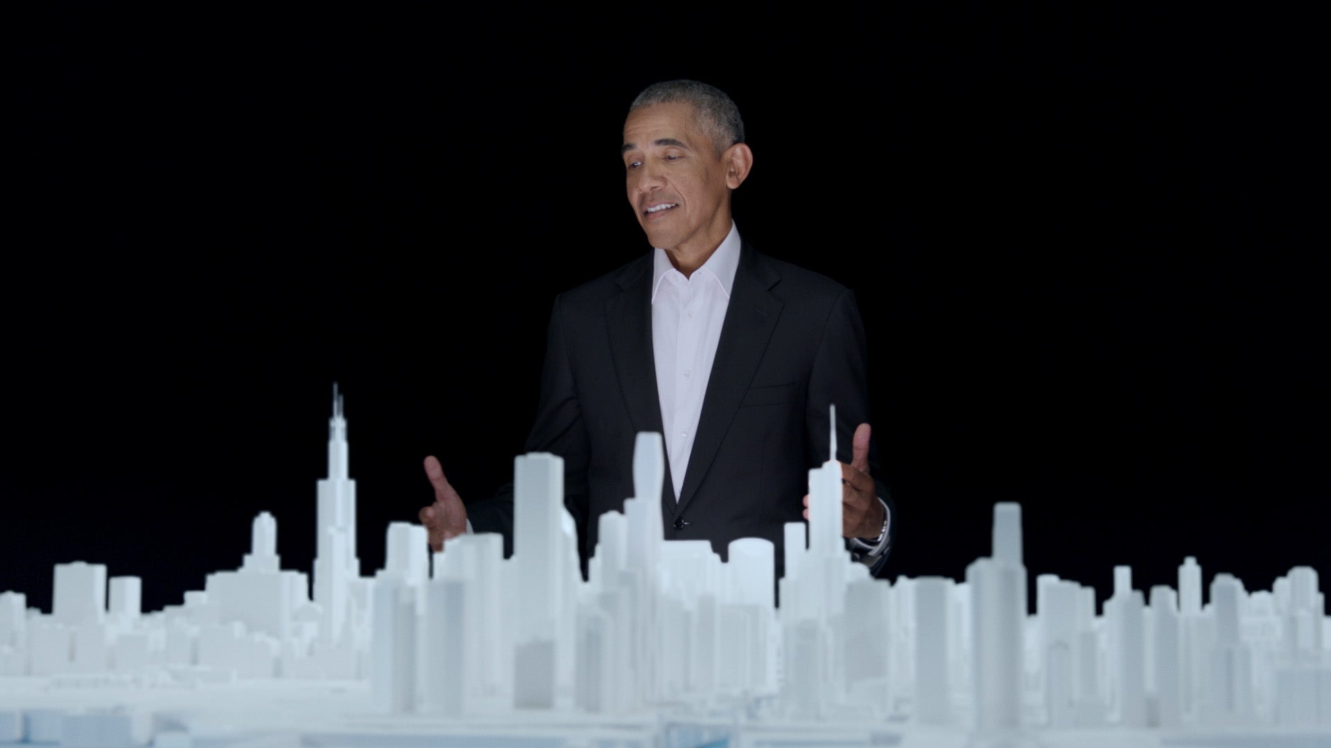Barack Obama with Microscape's 15 foot diameter circular model of Chicago