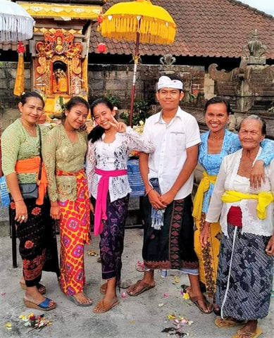 Balinese family wearing sarongs