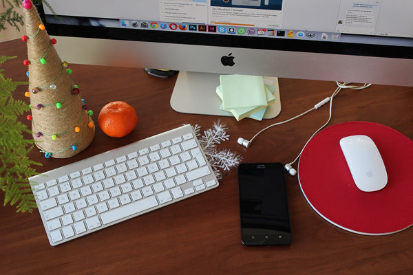 Jack Dusty Mens fashion and lifestyle blog, imac on desk with little christmas tree next to keyboard. 