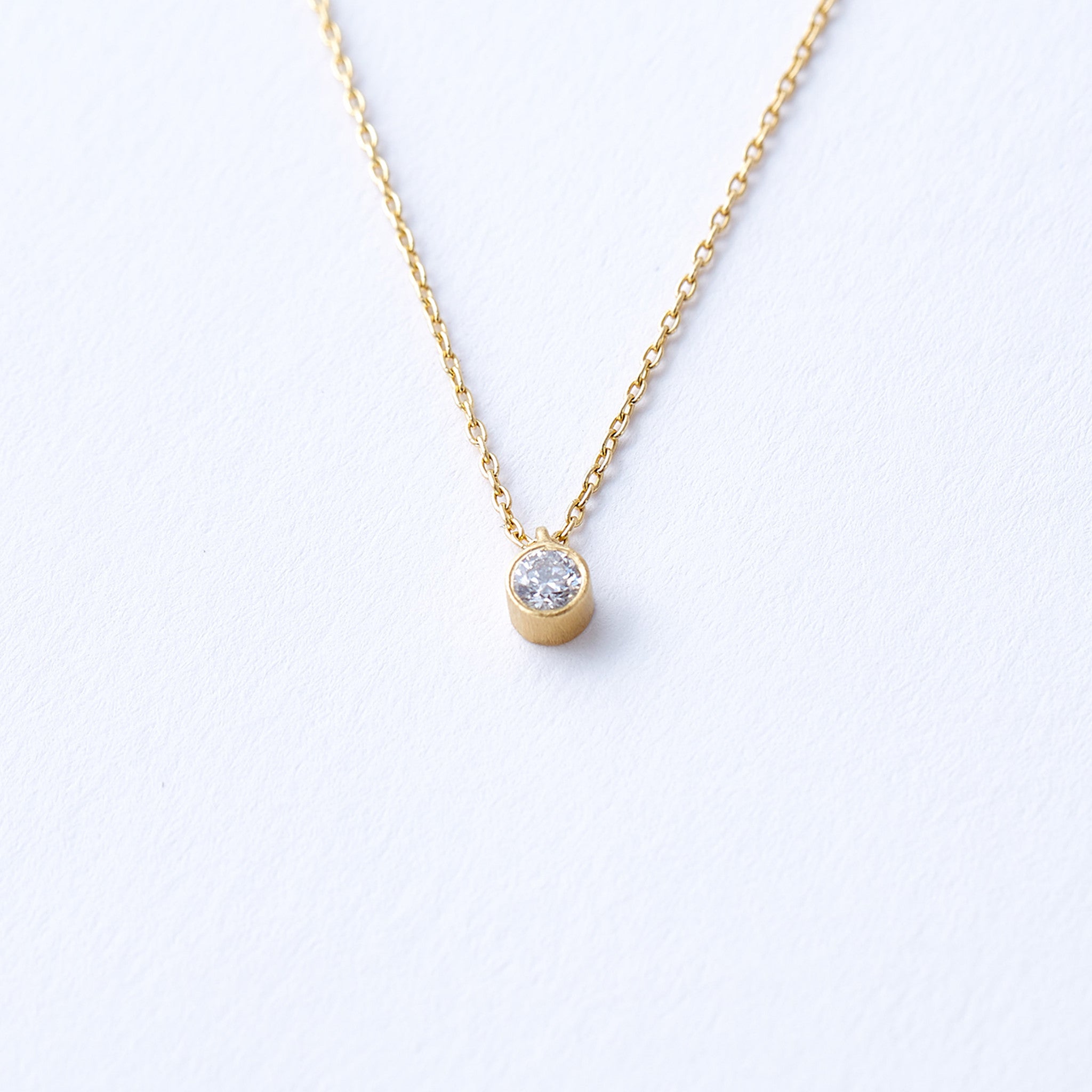 Yellow Gold Single Bezel Set Diamond Pendant