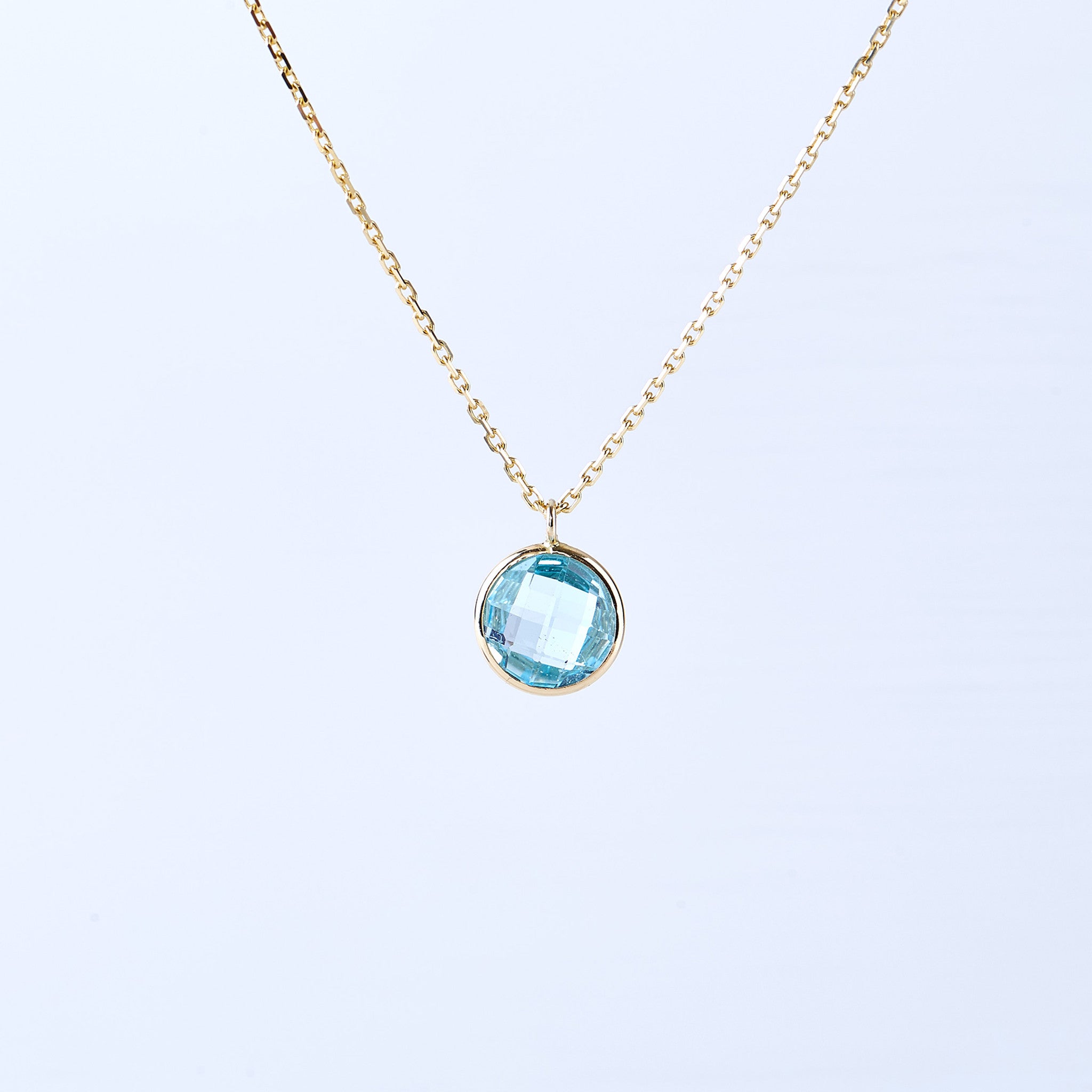 Blue Topaz and Yellow Gold Pendant