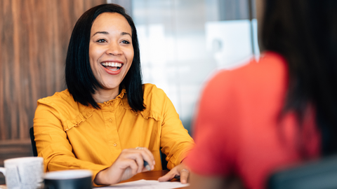 Woman smiling in meeting