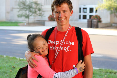 Best Buddies Texas Members Hugging 