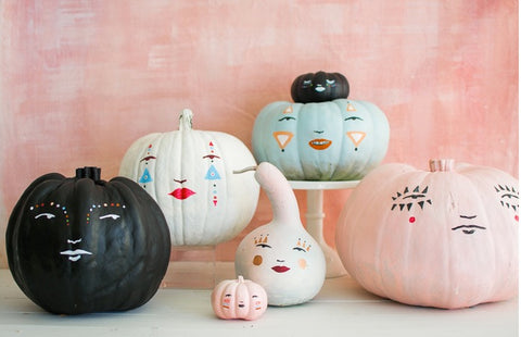 pastel pumkins with faces from the house that lars built