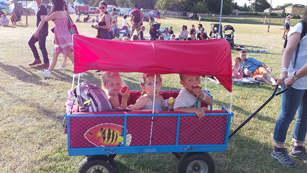 children in trolley at wilderness festival 