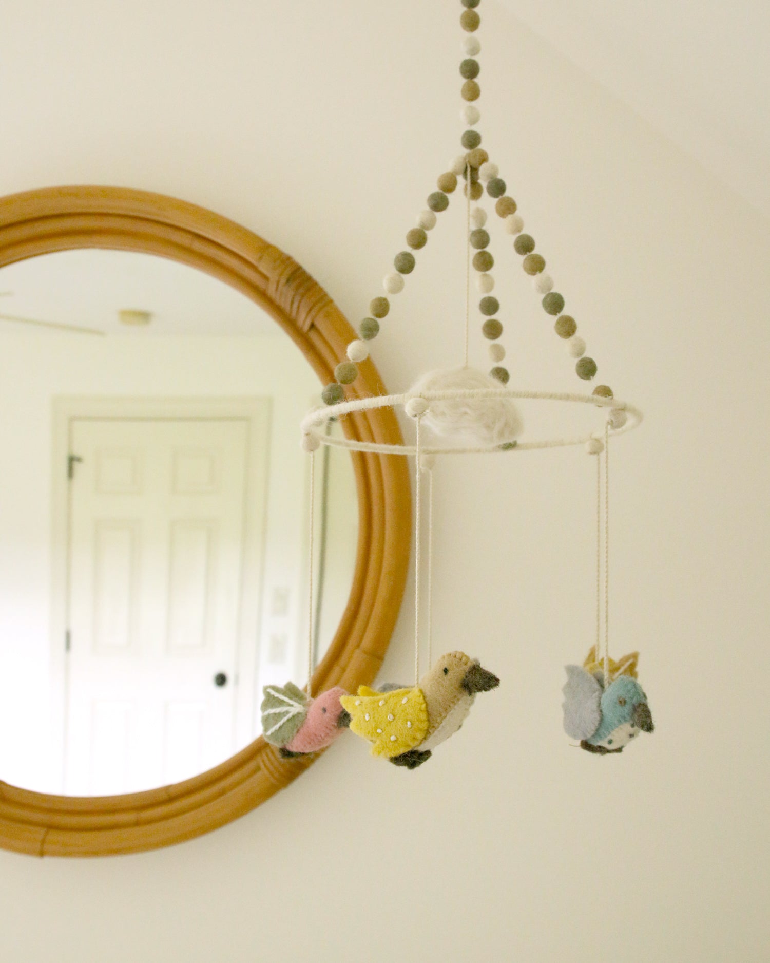 cute sparrow mobile in baby's neutral nursery