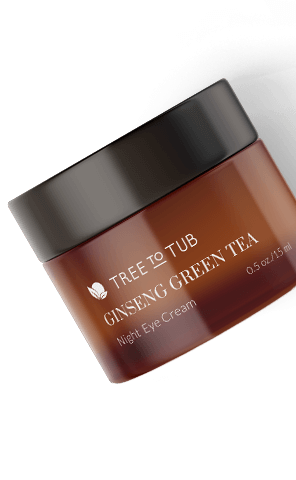 Slanted image of Ginseng Green Team Anti Aging Retinol Eye Cream amber-colored jar