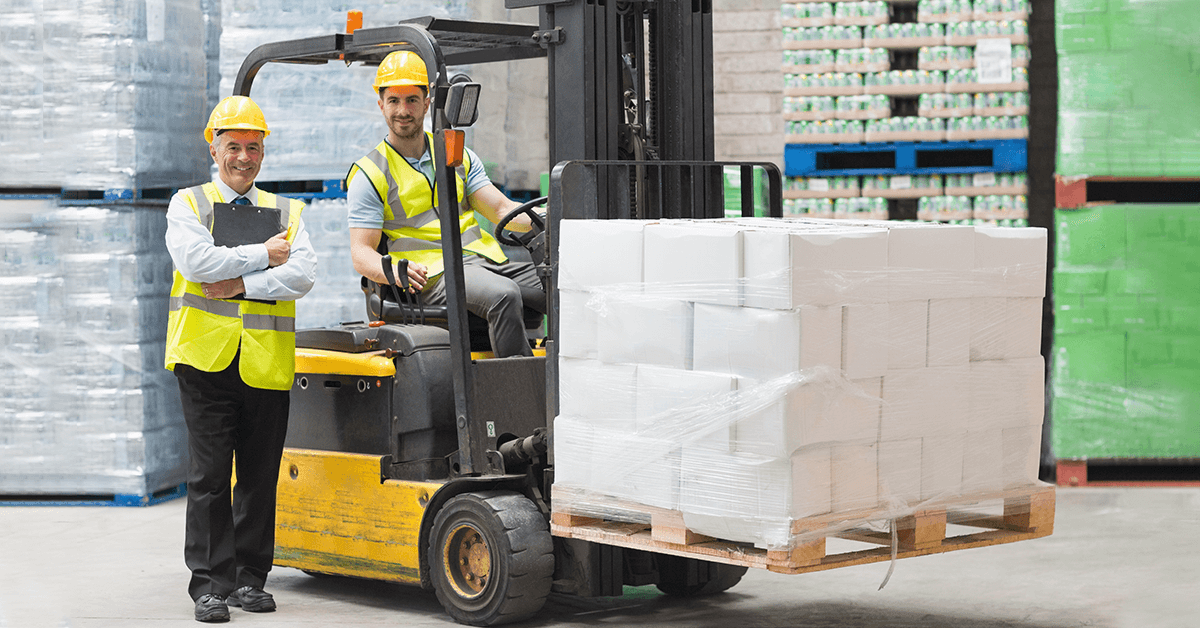 Forklifts-carrying-pallet-full-of-boxes