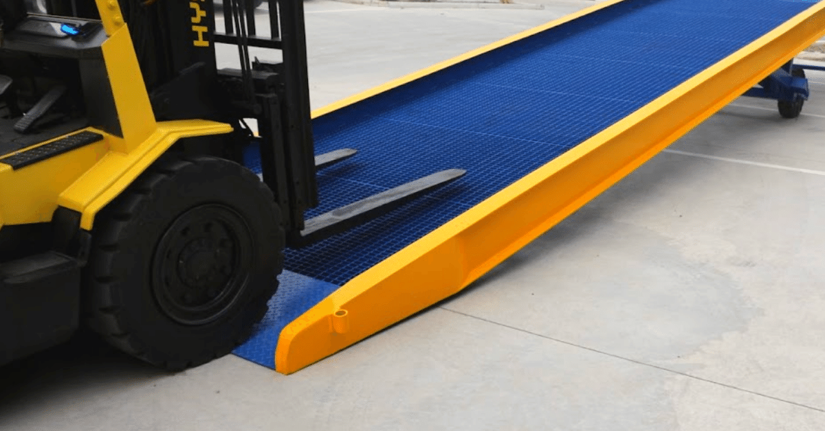 A forklift loading a yard ramp