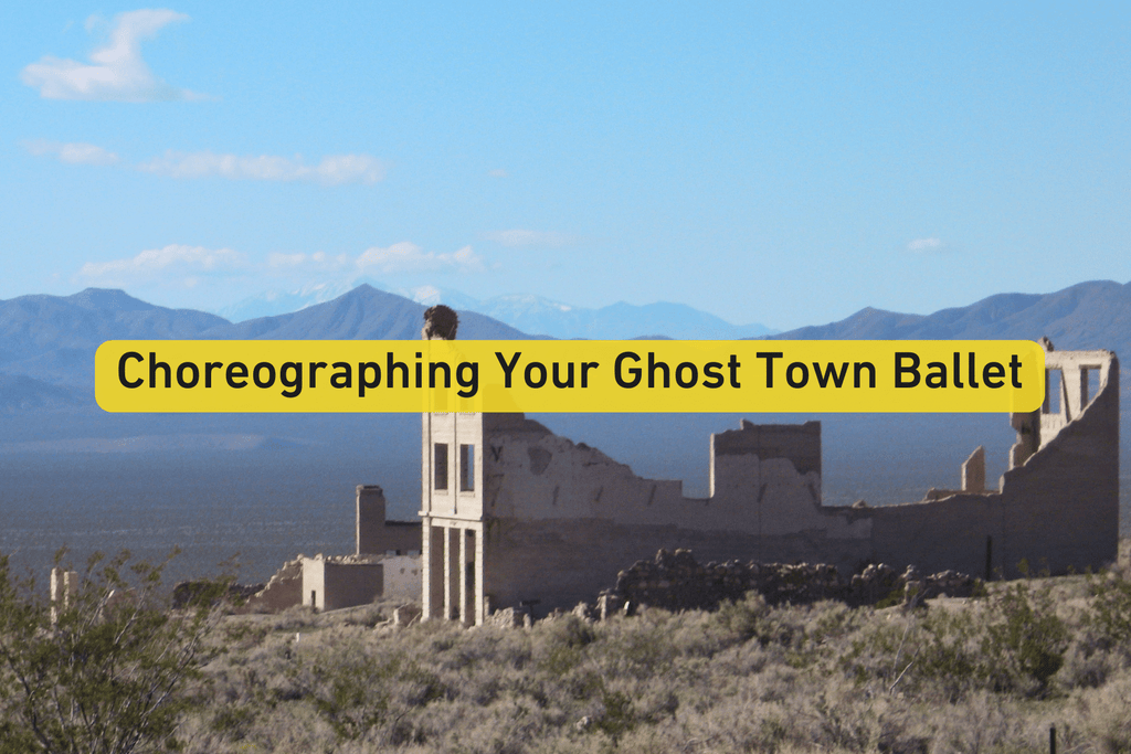 photo of ghost town ruins in a desert