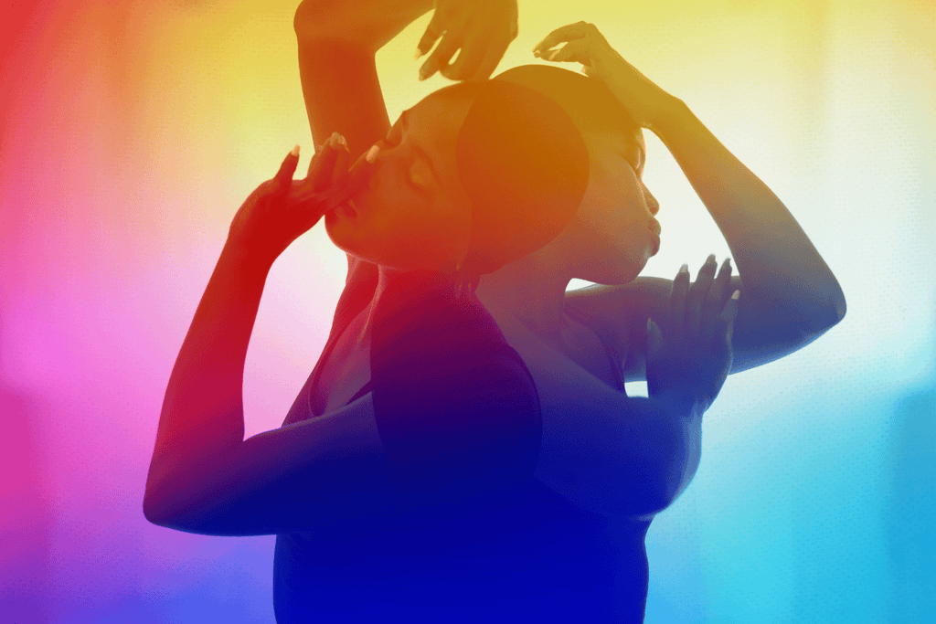 double exposure photo of a woman dancing in front of a rainbow background