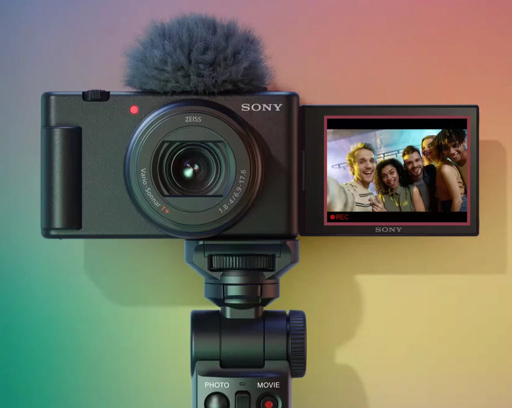 Sony Z-V1 Mark II on a small tripod against a colorful background