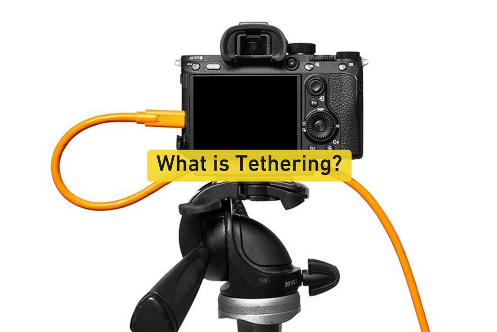 back of DSLR camera with an orange cable attached to it