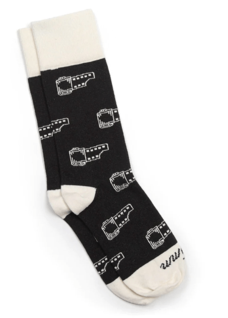 https://cdn.shopify.com/s/files/1/1267/4771/products/photogenic-supply-co-35mm-film-socks-black-498777.png?v=1683174576&width=736