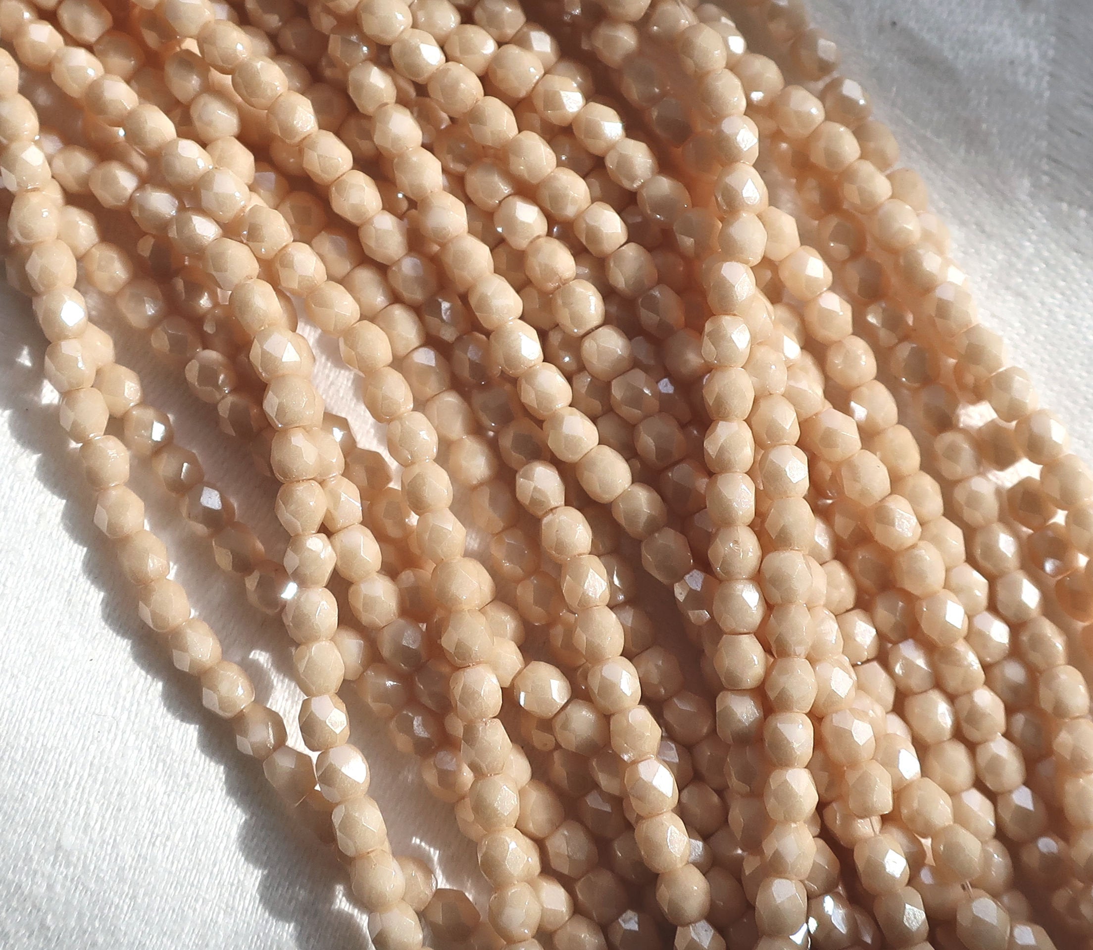 Lot of 3mm Off White Opaque Luster Champagne beads, – Glorious Glass Beads