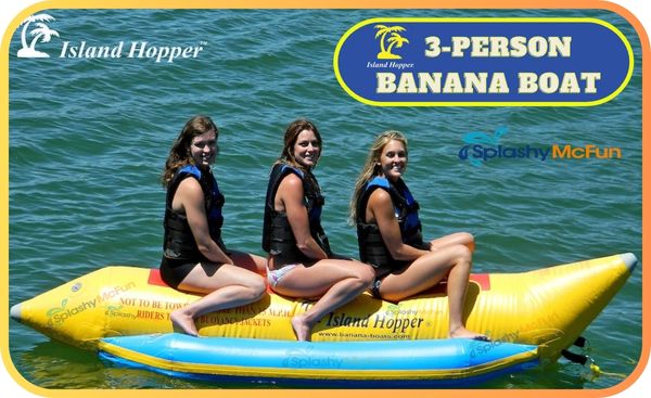 Island Hopper 3 Person banana boat tube sitting on the water with 3 women passengers