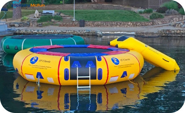 2 Island Hopper Classic 15ft Water Trampolines sit side by side on a lake. One is green, 1 is yellow.