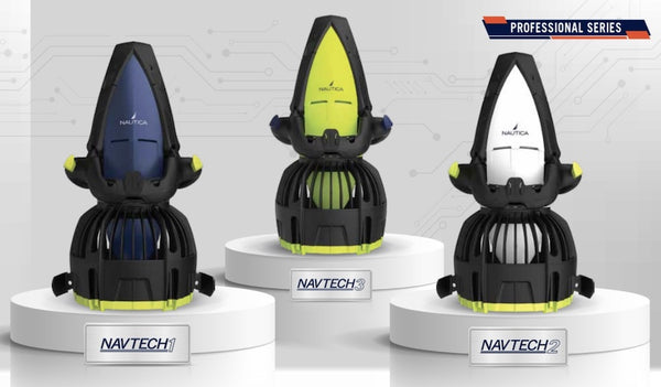 Nautica Professional Dive Series Seascooters are pictured. They are resting on the back protective cage around the motor of the underwater scooter. We see the top view. There are 3 sea scooters pictured: the navy blue Nautica NAVTECH1, white Nautica NAVTECH2, and the yellow Nautica NAVTECH3.