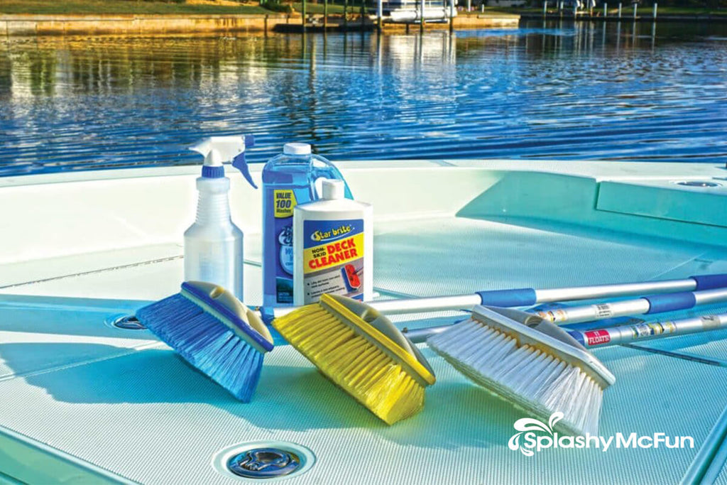A photo of boat cleaning chemicals and equipments on an inflatable boat.