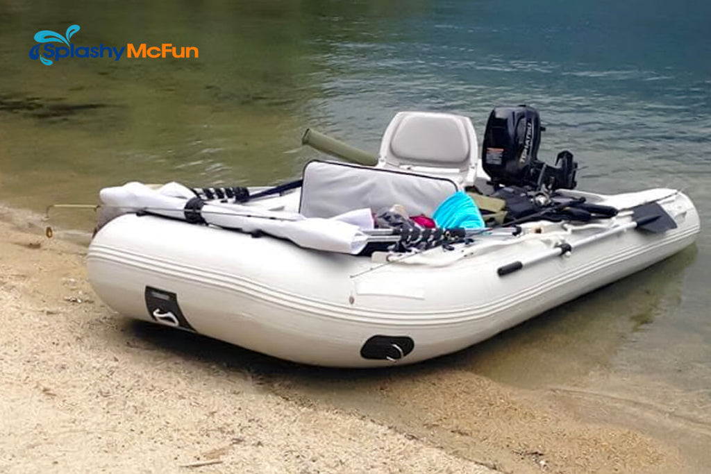 The Sea Eagle 10'6" Sport Runabout Boat parked by the shore.
