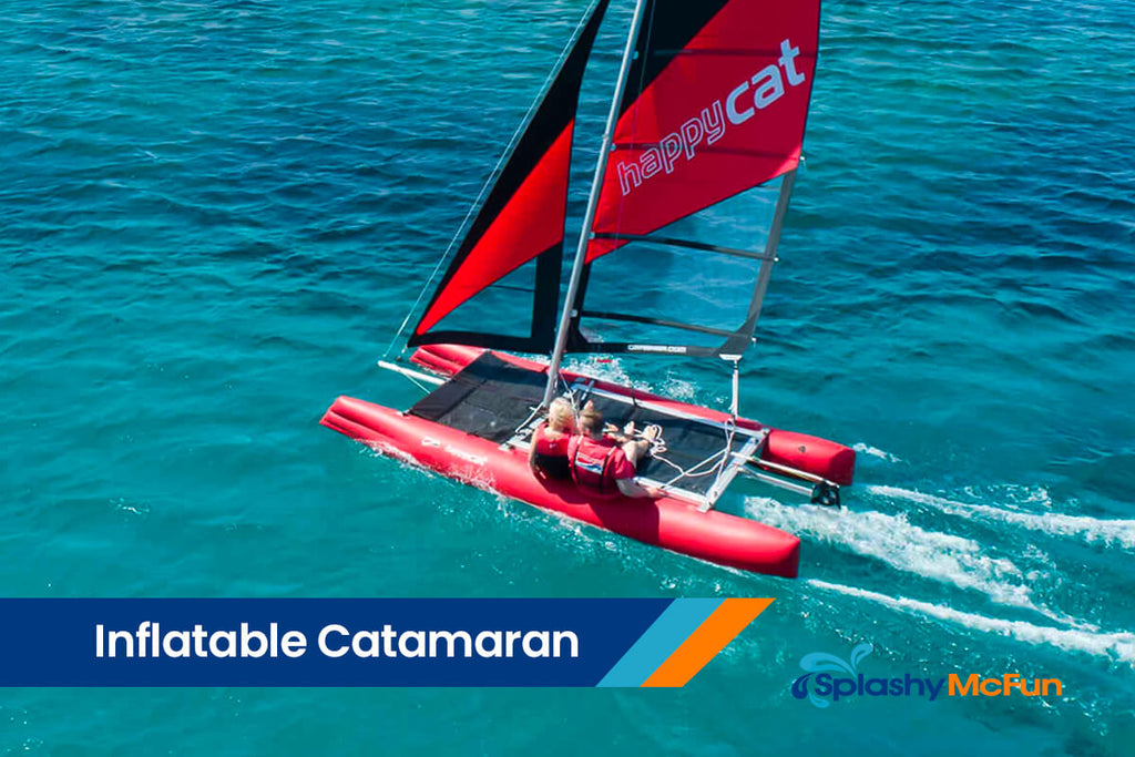 This is a red inflatable catamaran sailing on the water with 2 people on it.