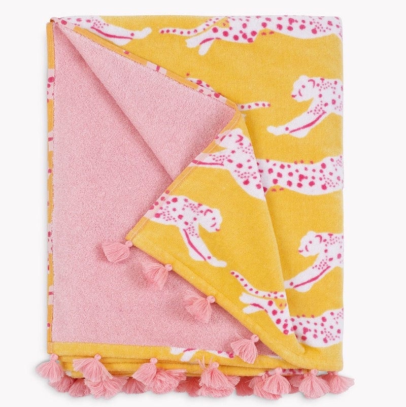 https://cdn.shopify.com/s/files/1/1268/4551/products/Leaping_leoapard_Beach_Towel_lemonade_matouk_schumacher_figlinensandhome_1600x.jpg?v=1691899674