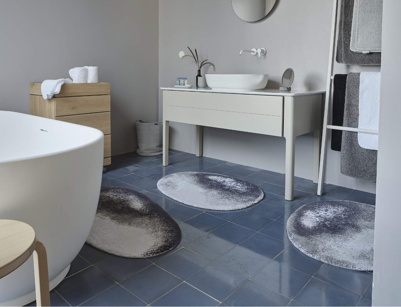 https://cdn.shopify.com/s/files/1/1268/4551/t/71/assets/abyss_and_habidecor_stone_bath_rug_fig_linens_and_home_difference_between_bath_rug_and_bath_mat-1686591766644.jpg?v=1686591767