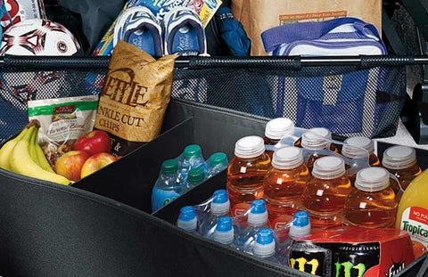 Keep snacks, water, extra tees and socks, towels and first aid kits in the trunk of your car