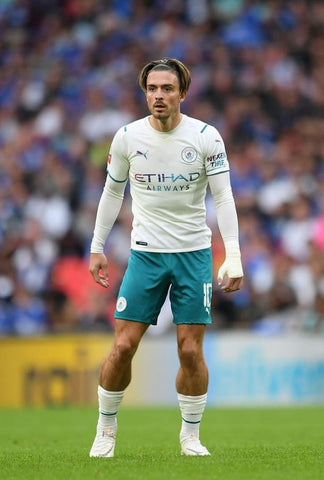 Jack Grealish ensuring the small socks can be seen