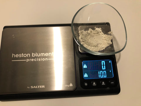 Weighing ingredients for a bentonite clay mask