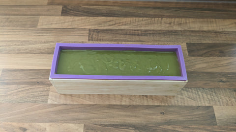 Wheatgrass soap setting in a mould
