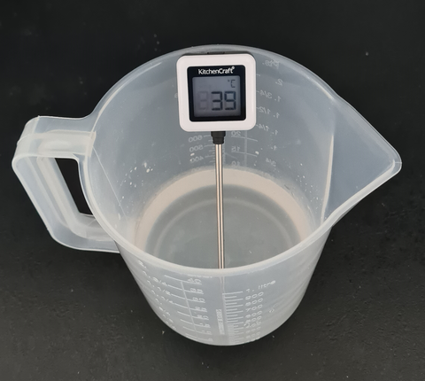 Check temperature of lye solution for cold process soap making