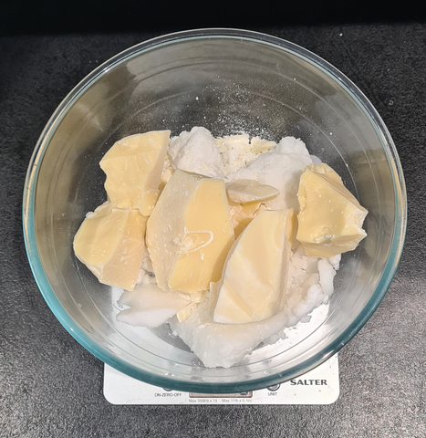Weigh cocoa butter soap ingredients